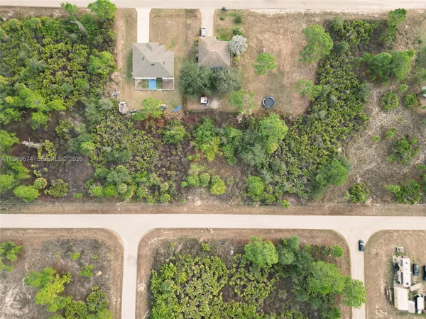 a view of a garden from a balcony