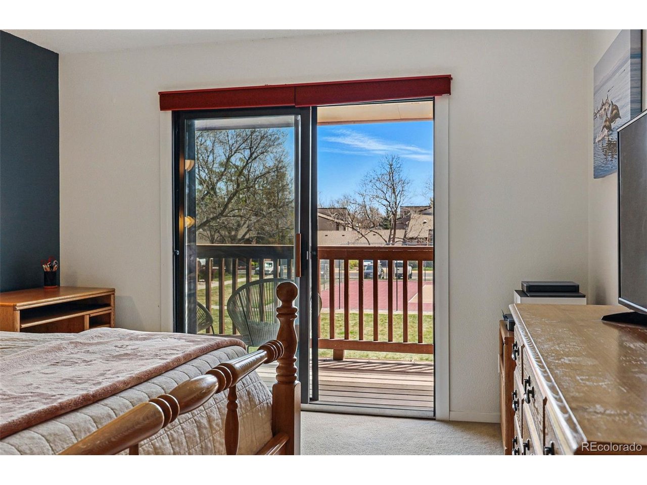 540 South Forest Street, Unit 204 Denver, CO 80246 - Photo 18 of 46 a bedroom with a bed and a window