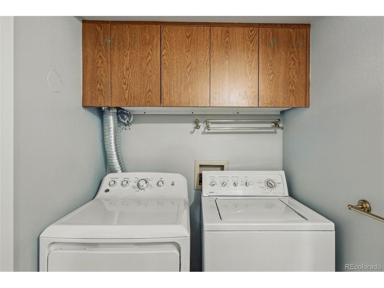 540 South Forest Street, Unit 204 Denver, CO 80246 - Photo 33 of 46 a utility room with dryer and washer