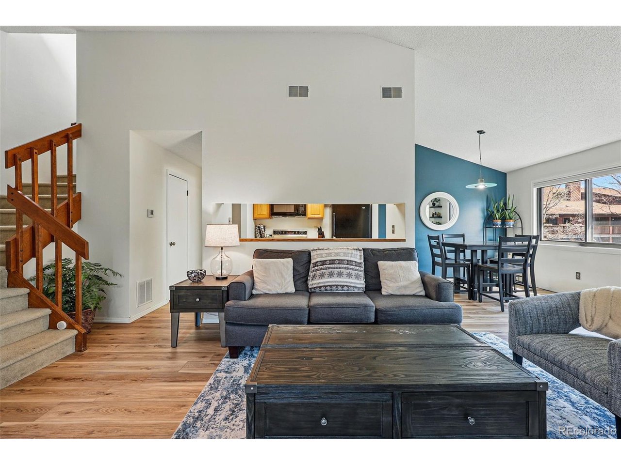540 South Forest Street, Unit 204 Denver, CO 80246 - Photo 5 of 46 a living room with furniture and wooden floor