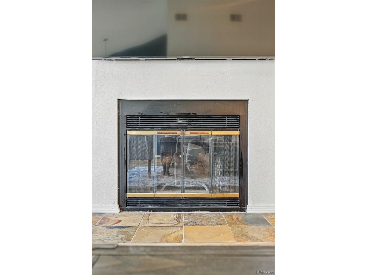 540 South Forest Street, Unit 204 Denver, CO 80246 - Photo 7 of 46 a living room with a fireplace