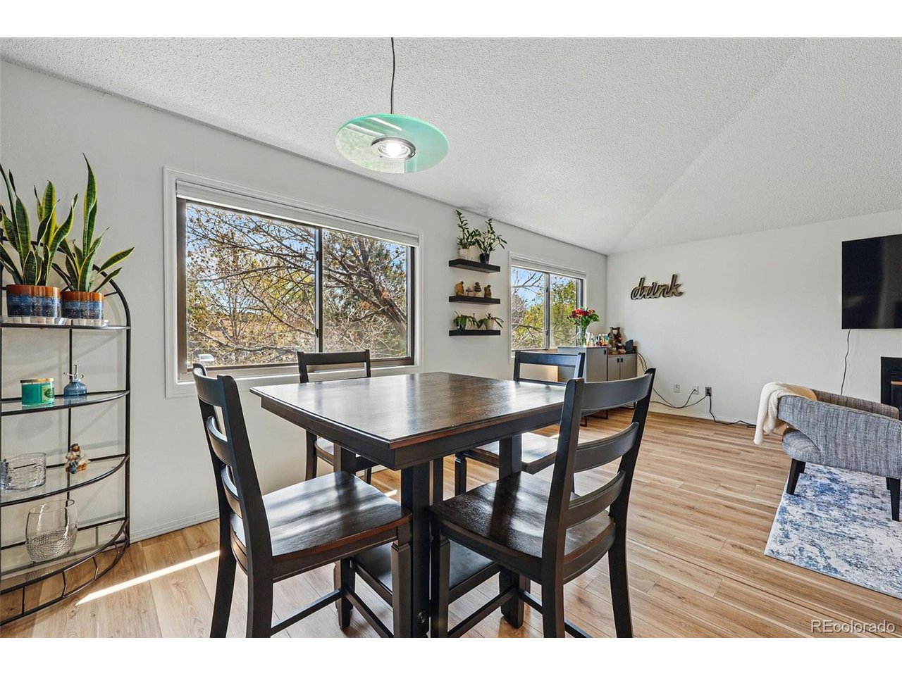 540 South Forest Street, Unit 204 Denver, CO 80246 - Photo 9 of 46 a dining room with furniture and window