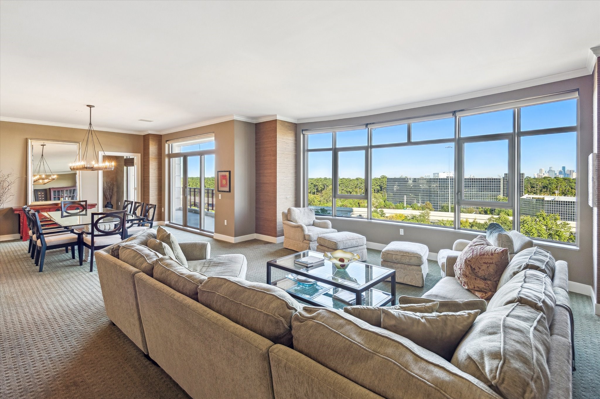 1000 Uptown Park Boulevard, Unit 93 Houston, TX 77056 - Photo 1 of 37 a living room with furniture and a large window