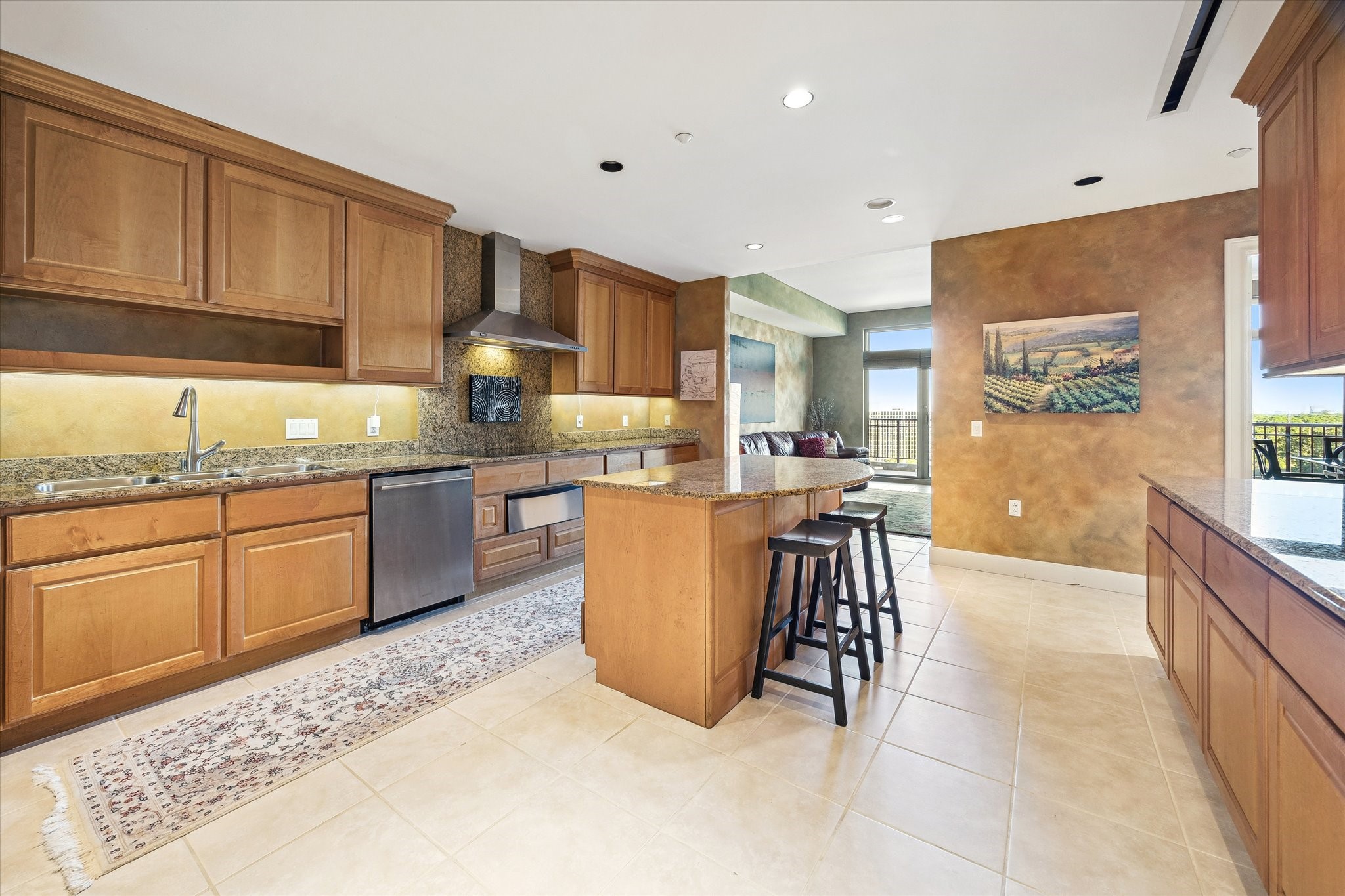 1000 Uptown Park Boulevard, Unit 93 Houston, TX 77056 - Photo 11 of 37 a kitchen with a sink a counter top space and appliances