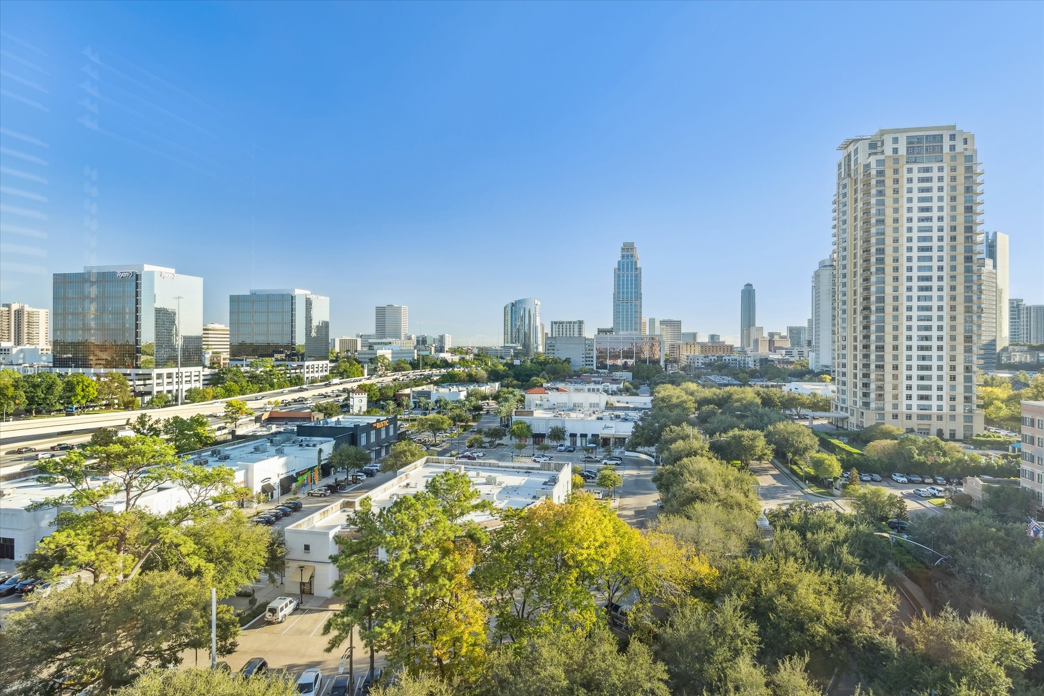 1000 Uptown Park Boulevard, Unit 93 Houston, TX 77056 - Photo 24 of 37 a city view with tall buildings