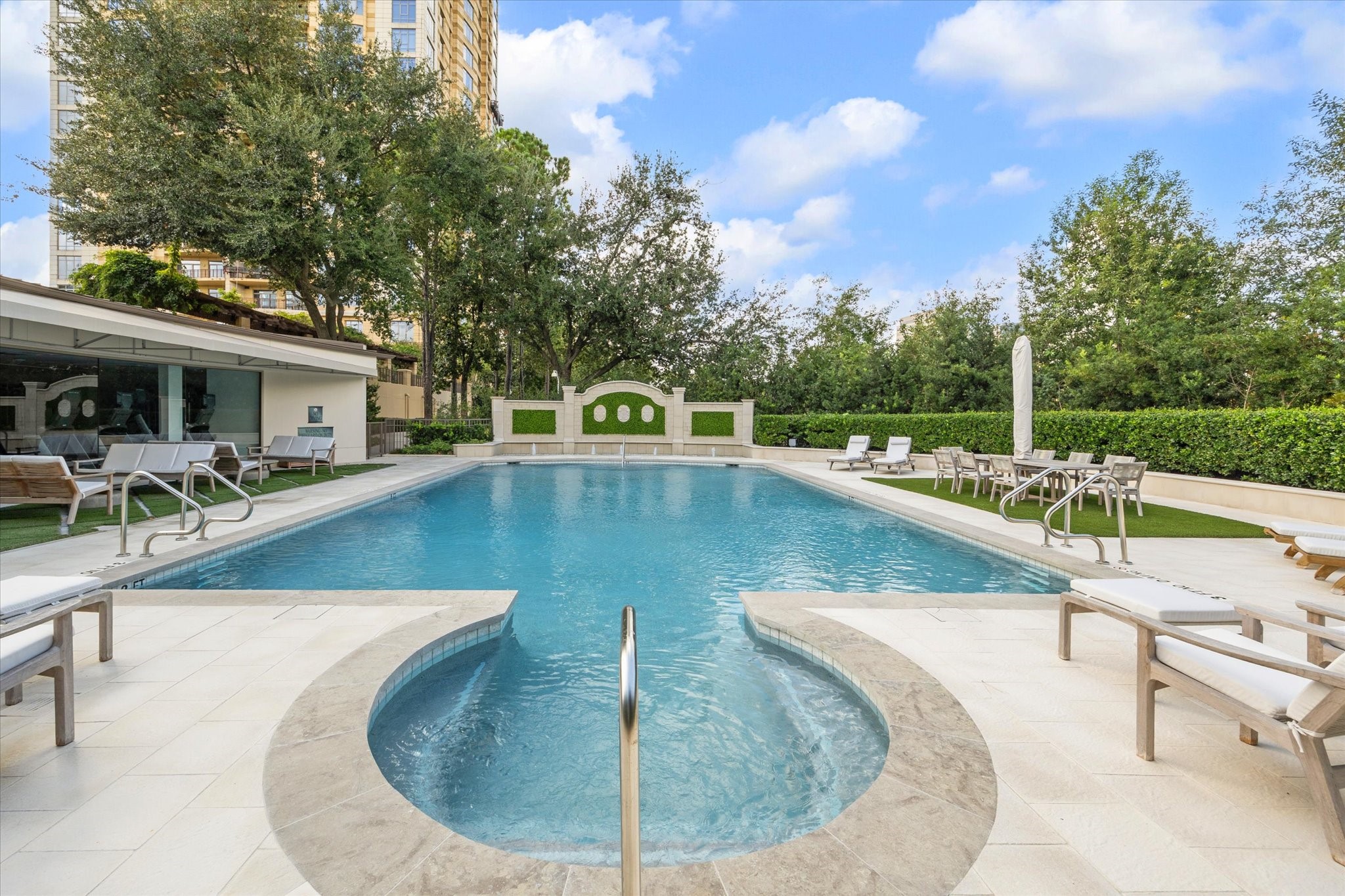 1000 Uptown Park Boulevard, Unit 93 Houston, TX 77056 - Photo 32 of 37 a view of a swimming pool with outdoor seating