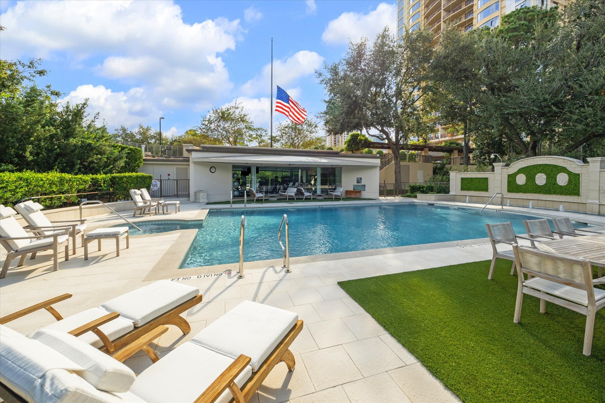1000 Uptown Park Boulevard, Unit 93 Houston, TX 77056 - Photo 33 of 37 a view of a patio with dining table and chairs with a yard