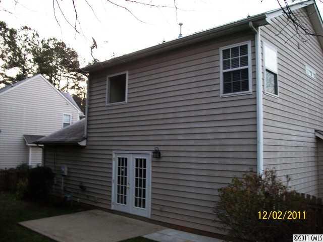 14610 Laura Michelle Road Huntersville, NC 28078 - Photo 2 of 13 a front view of a house with plants