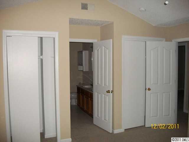 14610 Laura Michelle Road Huntersville, NC 28078 - Photo 12 of 13 a view of a hallway with closet and bathroom