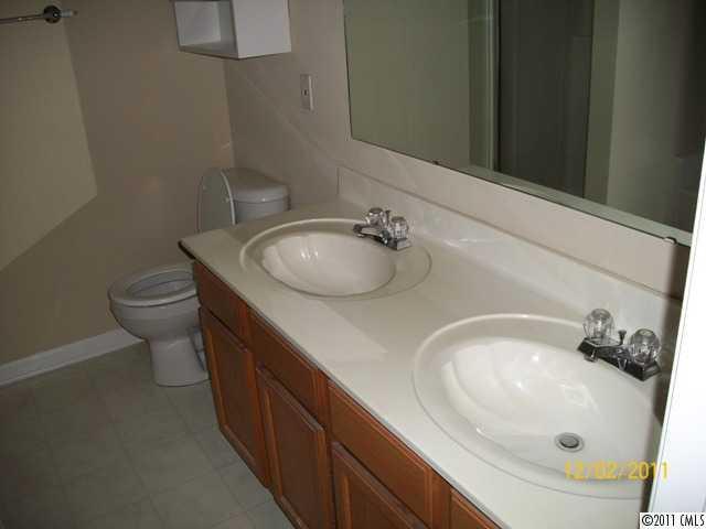 14610 Laura Michelle Road Huntersville, NC 28078 - Photo 13 of 13 a bathroom with a sink and a toilet