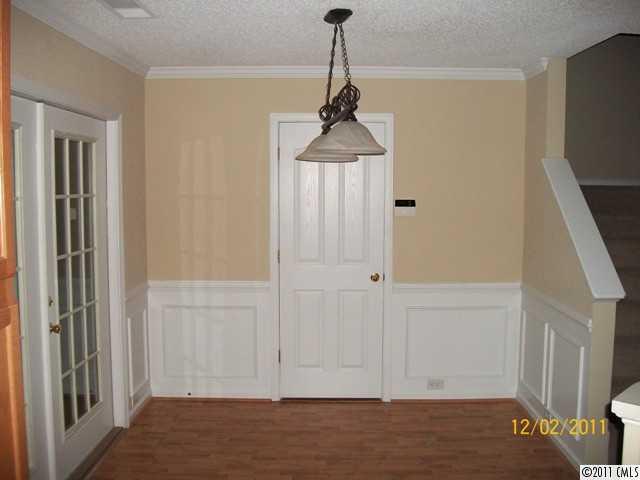 14610 Laura Michelle Road Huntersville, NC 28078 - Photo 5 of 13 a view of hallway with chandelier and entryway