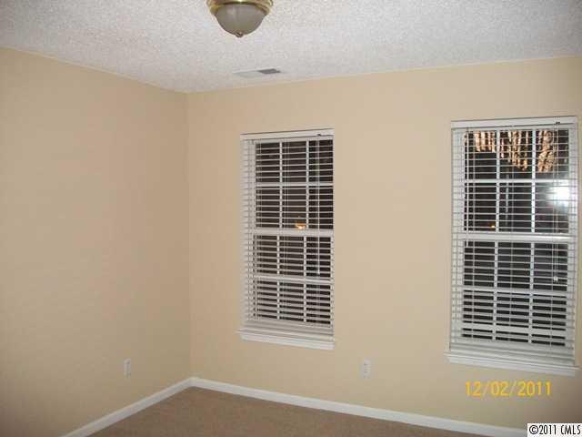 14610 Laura Michelle Road Huntersville, NC 28078 - Photo 7 of 13 a view of a room and window