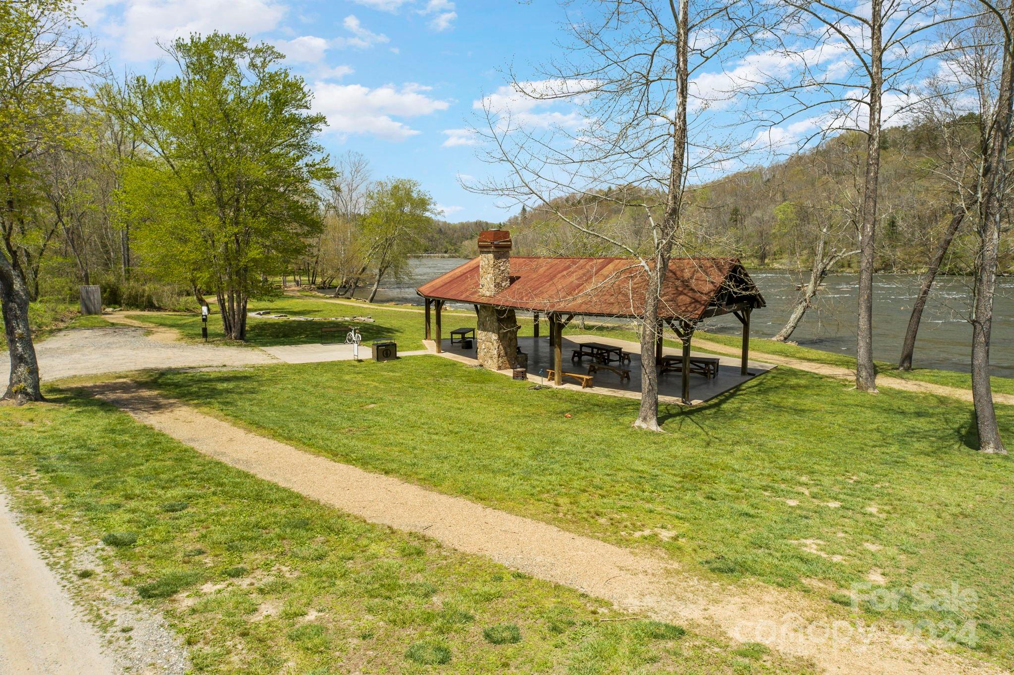 240 Westridge Farm Road, Unit 19 Asheville, NC 28804 - Photo 11 of 31 a view of a swimming pool with a garden