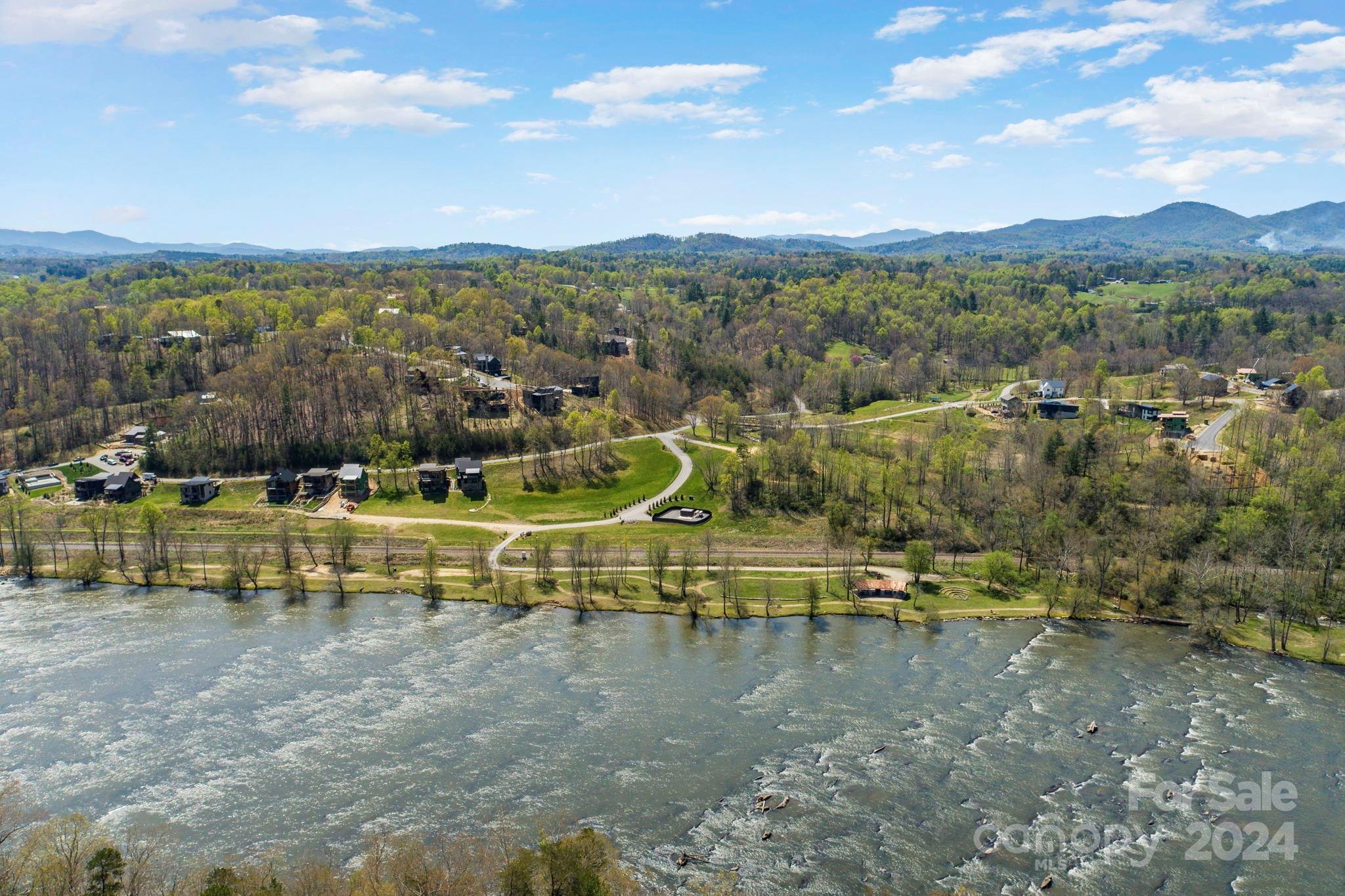 240 Westridge Farm Road, Unit 19 Asheville, NC 28804 - Photo 25 of 31 a view of a town with mountains in the background