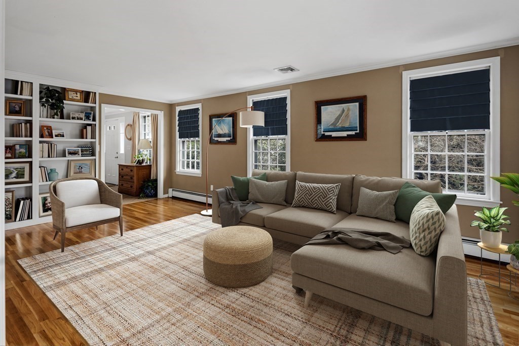 11 Chamberlain Run Hingham, MA 02043 - Photo 8 of 19 a living room with furniture and a potted plant