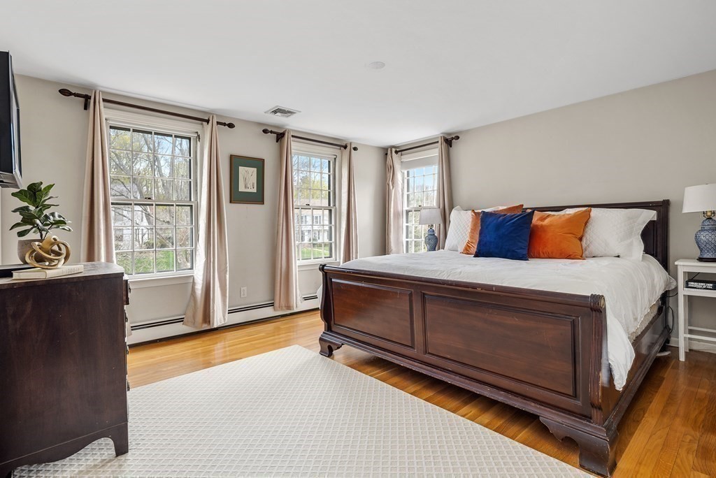 11 Chamberlain Run Hingham, MA 02043 - Photo 9 of 19 a bedroom with a bed and window