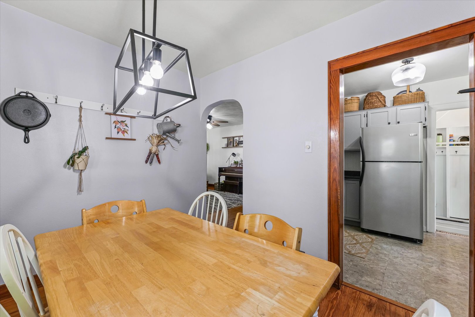 319 West Bond Street Monticello, IL 61856 - Photo 11 of 34 a bedroom with a bed and a chandelier
