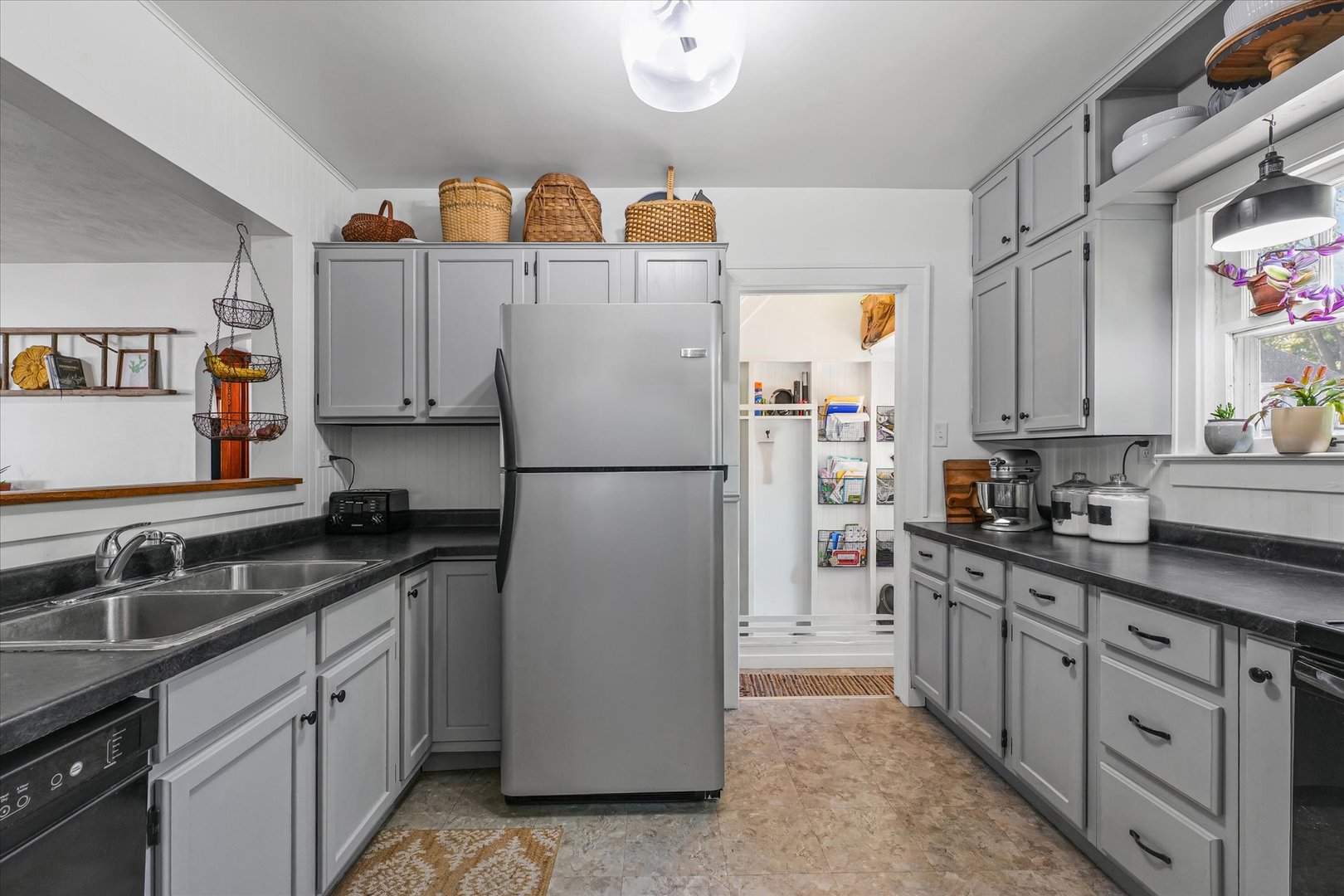 319 West Bond Street Monticello, IL 61856 - Photo 13 of 34 a kitchen with stainless steel appliances granite countertop a sink stove and refrigerator