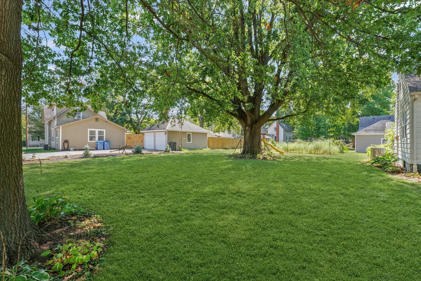 319 West Bond Street Monticello, IL 61856 - Photo 29 of 34 a view of house with backyard and garden