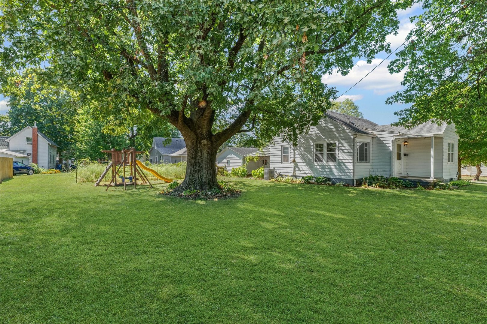 319 West Bond Street Monticello, IL 61856 - Photo 30 of 34 a house view with a garden space
