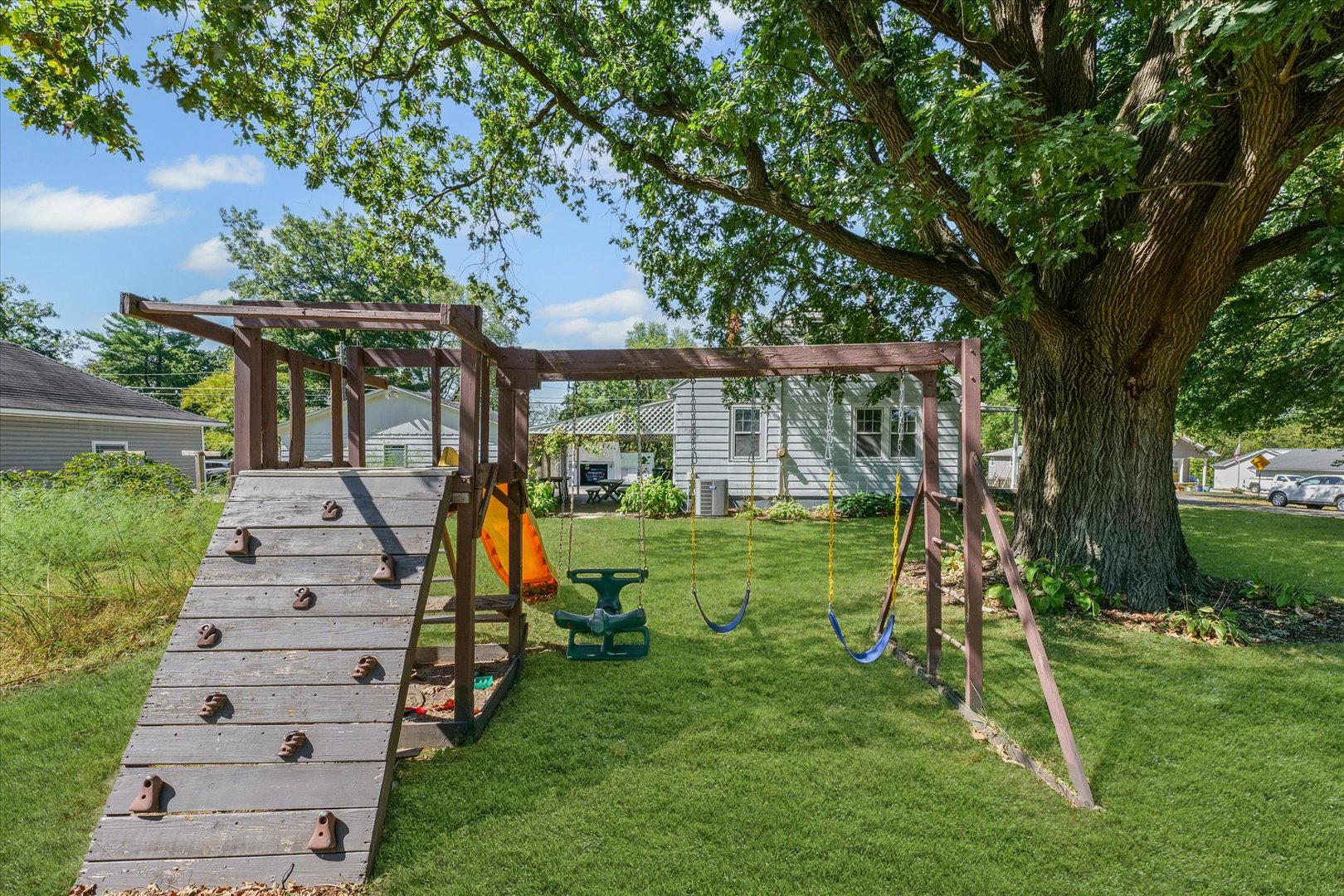 319 West Bond Street Monticello, IL 61856 - Photo 31 of 34 a view of a house with a backyard
