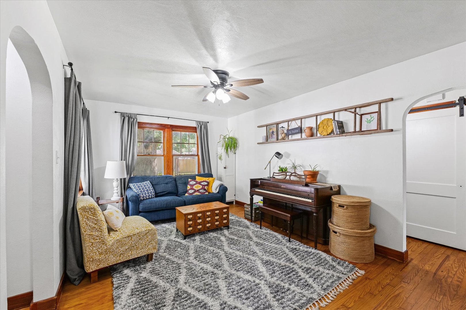 319 West Bond Street Monticello, IL 61856 - Photo 6 of 34 a living room with furniture and a window