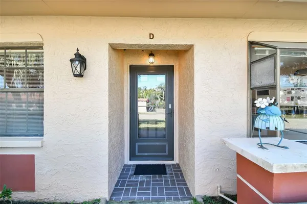a view of a hallway and dining room