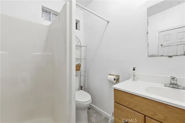 a view of a terrace next to a yard