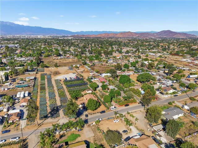 an aerial view of a residential apartment building with swimming pool