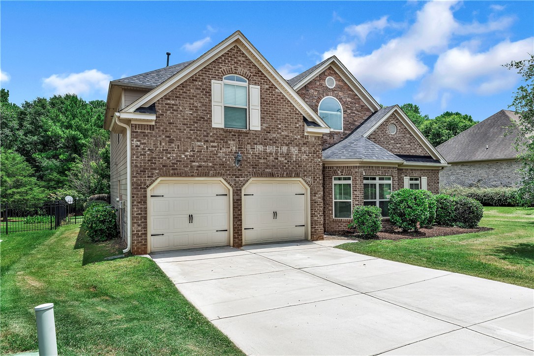 144 Buckland Drive Anderson, SC 29621 - Photo 48 of 48 A well-maintained brick exterior with a broad driveway offers inviting curb appeal.
