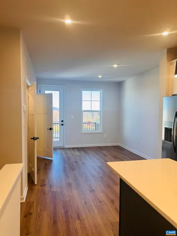 a view of an empty room and window