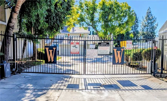 a view of a house with swimming pool