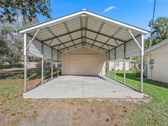 an aerial view of a house with a garden