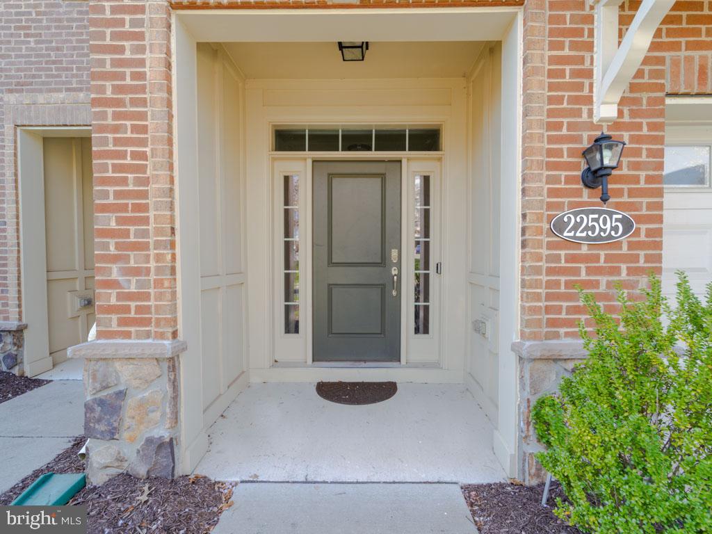 22595 Windsor Locks Square Ashburn, VA 20148 - Photo 3 of 56 a view of a door of the house