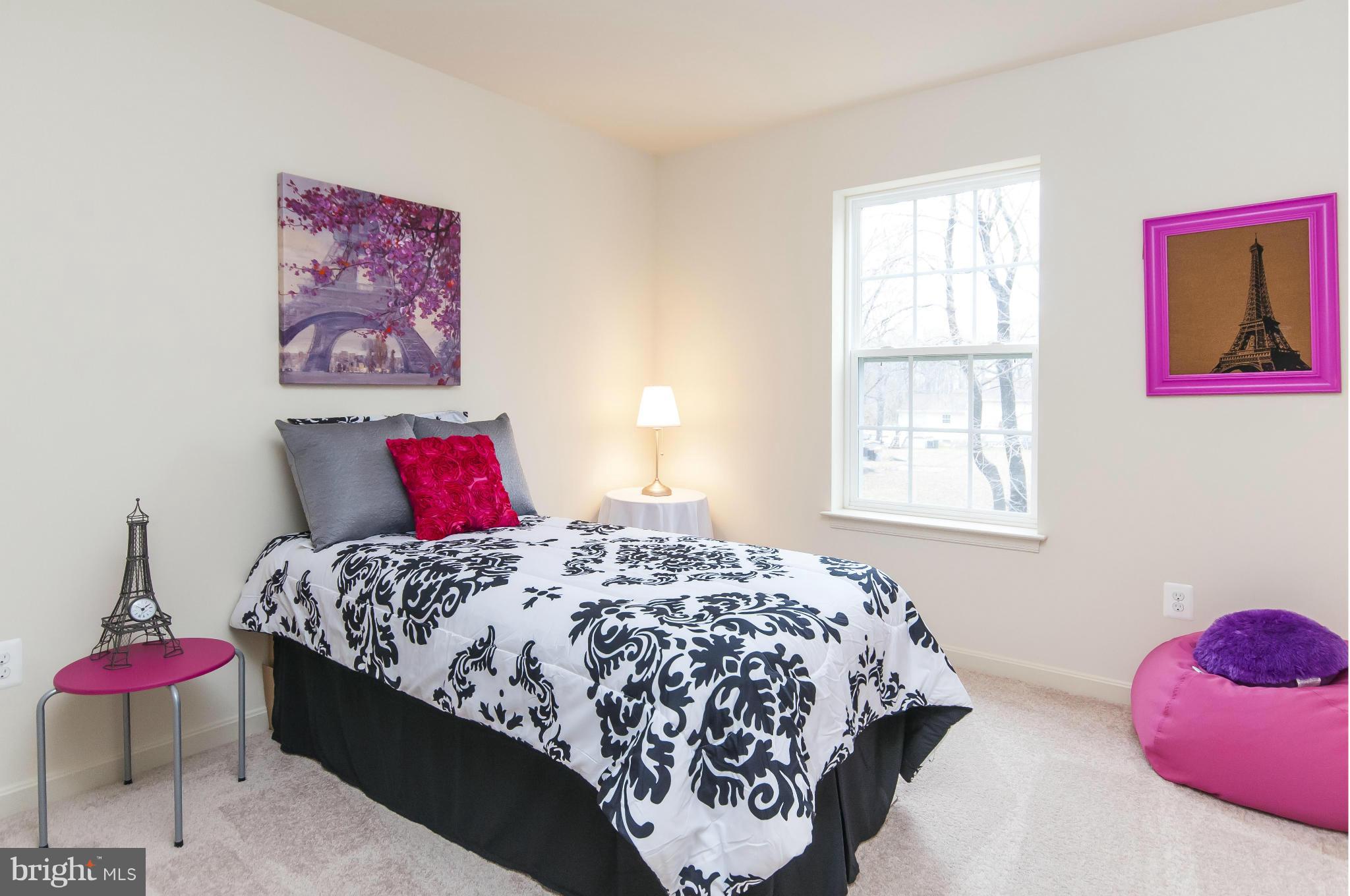 1622 Renaissance Drive Baltimore, MD 21221 - Photo 9 of 20 a bedroom with bed and a window