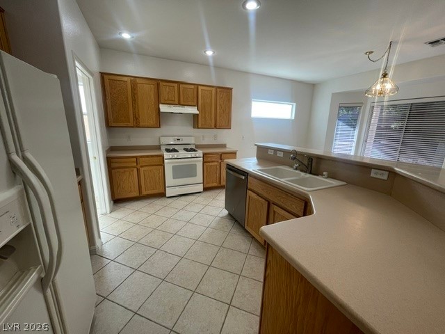 3047 Hickory Valley Road Henderson, NV 89052 - Photo 8 of 21 A functional kitchen boasts ample cabinetry and a practical breakfast bar.