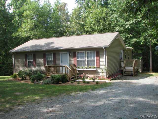 1637 Gardners Road Mineral, VA 23117 - Photo 1 of 1 a front view of a house with garden