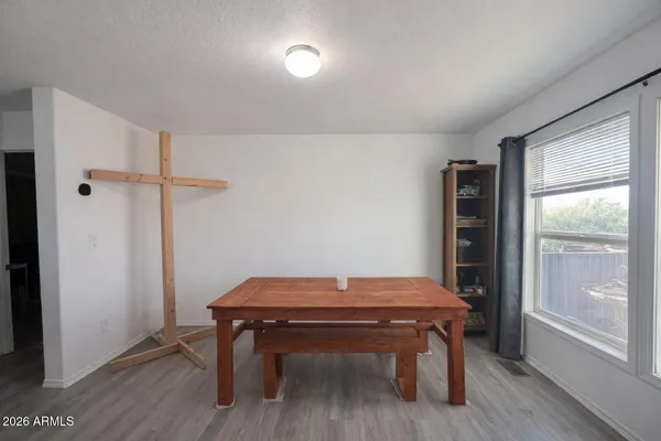 a room with furniture and wooden floor