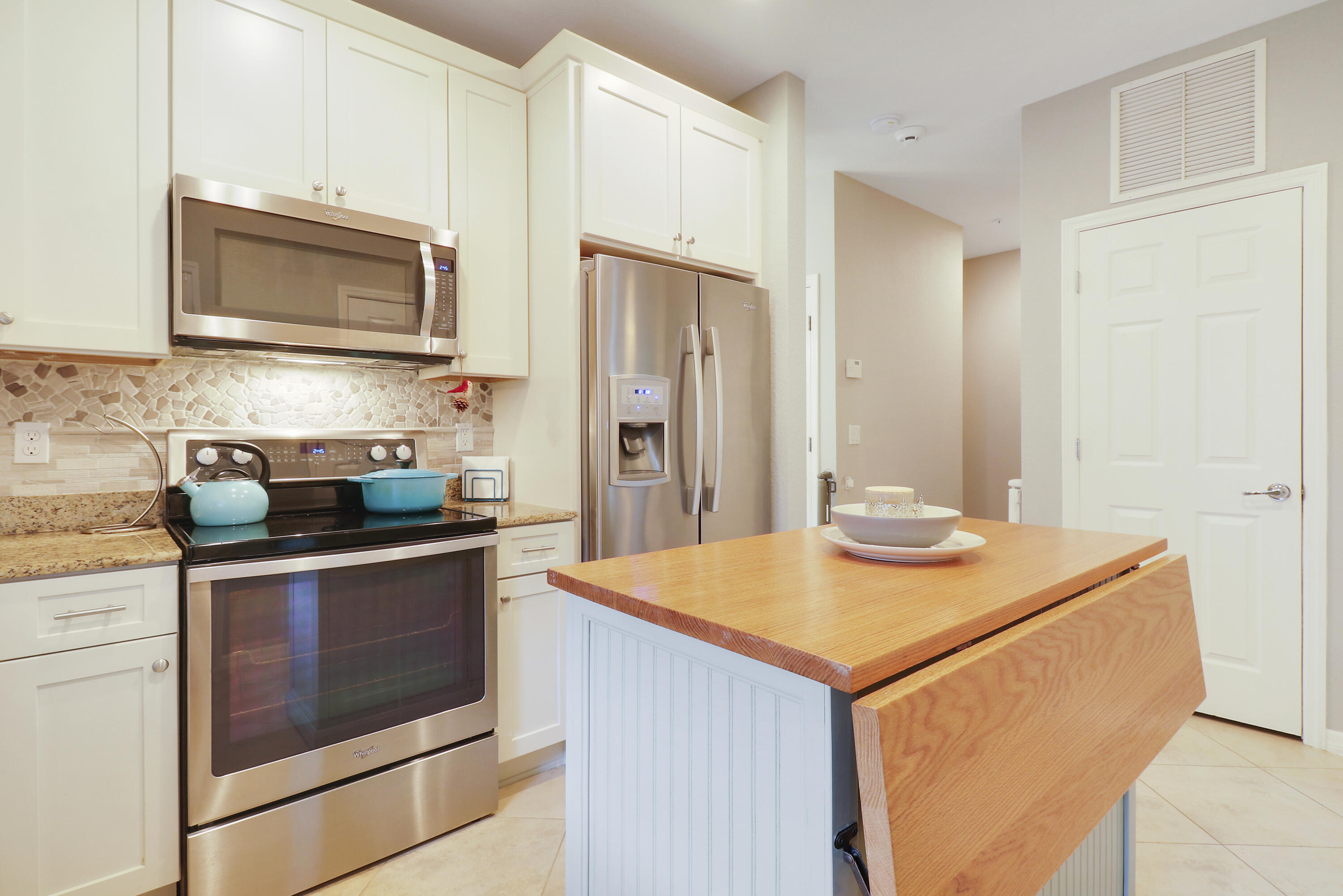 115 Black Ironwood Road, Unit 105 Jupiter, FL 33458 - Photo 6 of 24 upgraded kitchen
