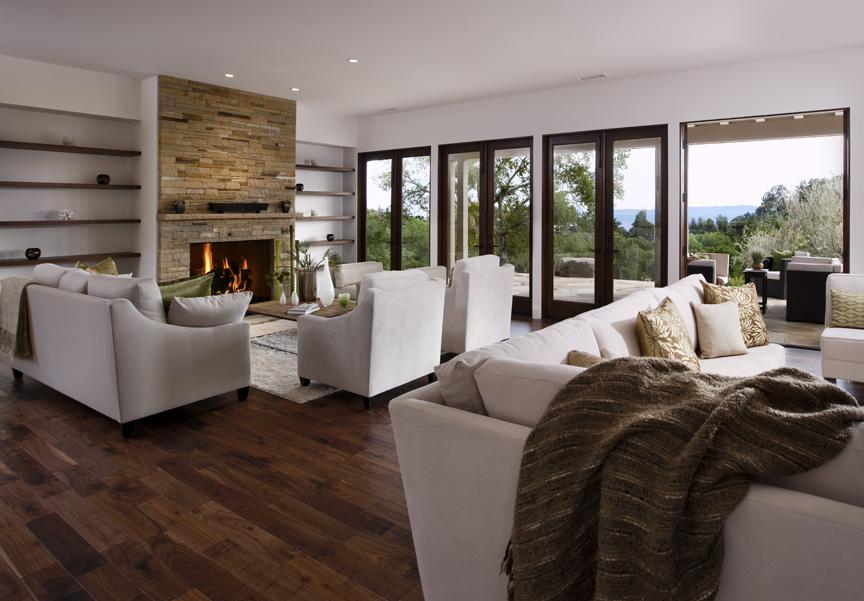 2888 East Valley Road Montecito, CA 93108 - Photo 2 of 7 a living room with furniture large windows and a fireplace