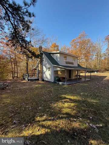 a view of a town with large trees
