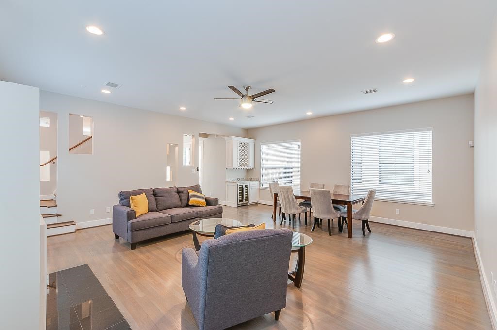 650 Birdsall Street Houston, TX 77007 - Photo 13 of 29 Wood floors, recessed lights, and modern ceiling fan