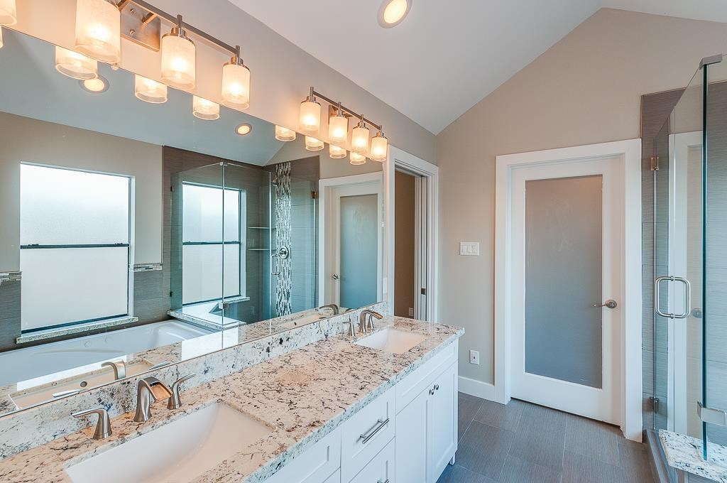 650 Birdsall Street Houston, TX 77007 - Photo 29 of 29 Primary bath w/ dual vanity, granite counter tops, and modern fixtures