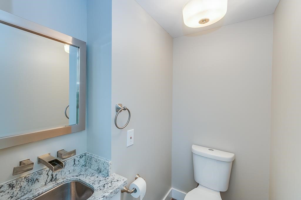 650 Birdsall Street Houston, TX 77007 - Photo 8 of 29 1/2 bath w/ granite and modern fixture