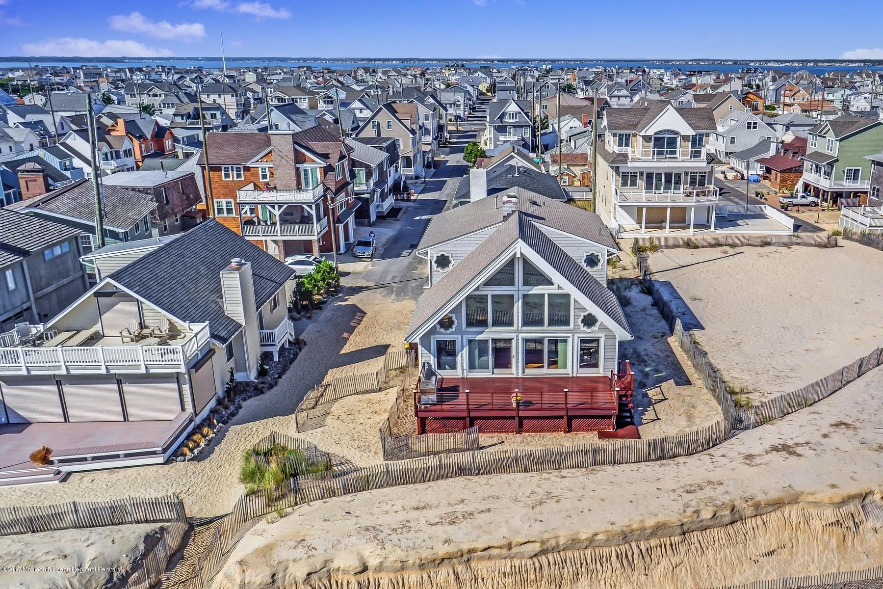 10 East Colony Road Lavallette, NJ 08735 - Photo 1 of 42 an aerial view of a house with a yard