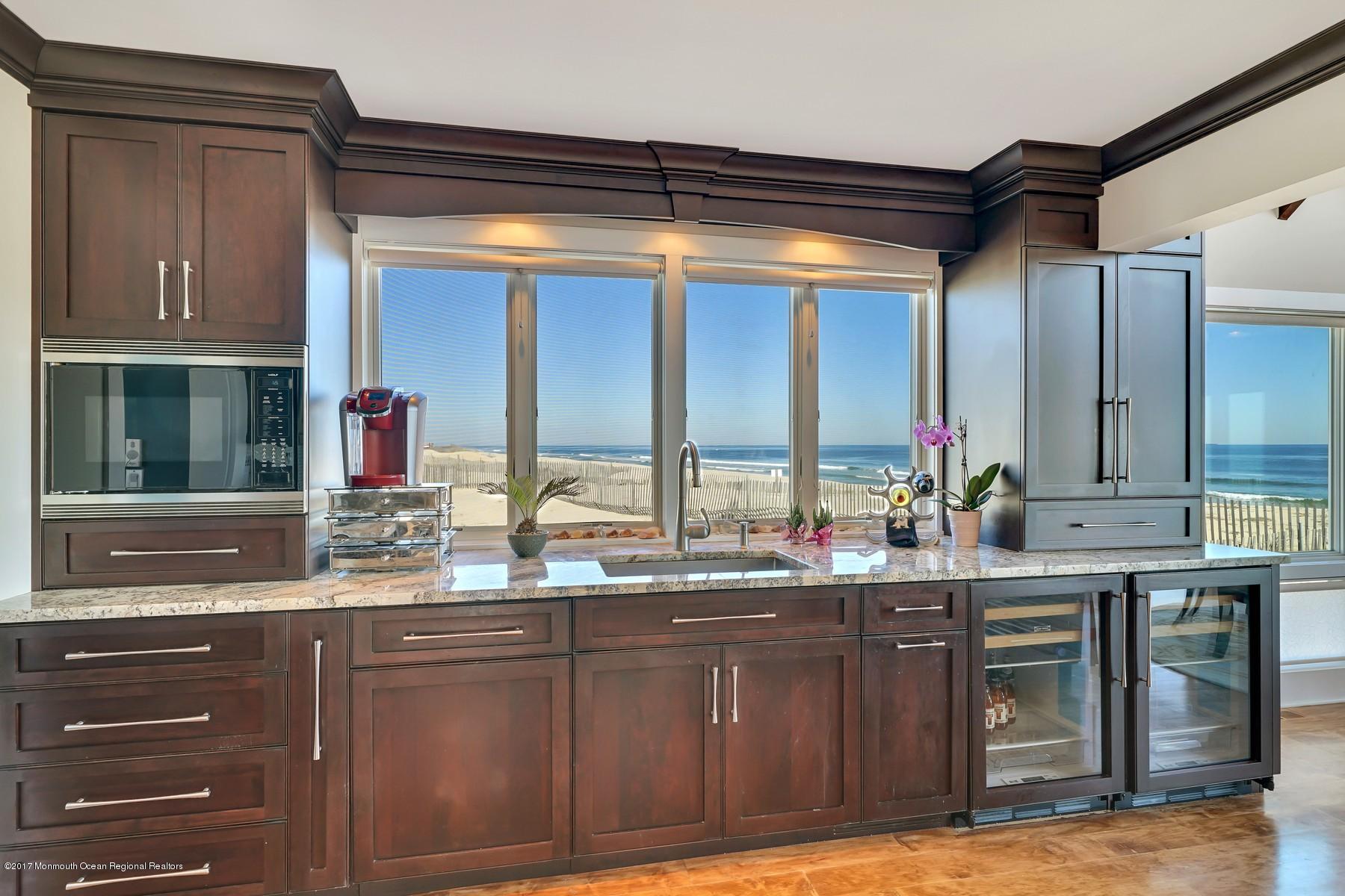 10 East Colony Road Lavallette, NJ 08735 - Photo 13 of 42 a kitchen with kitchen island granite countertop a sink and a stove