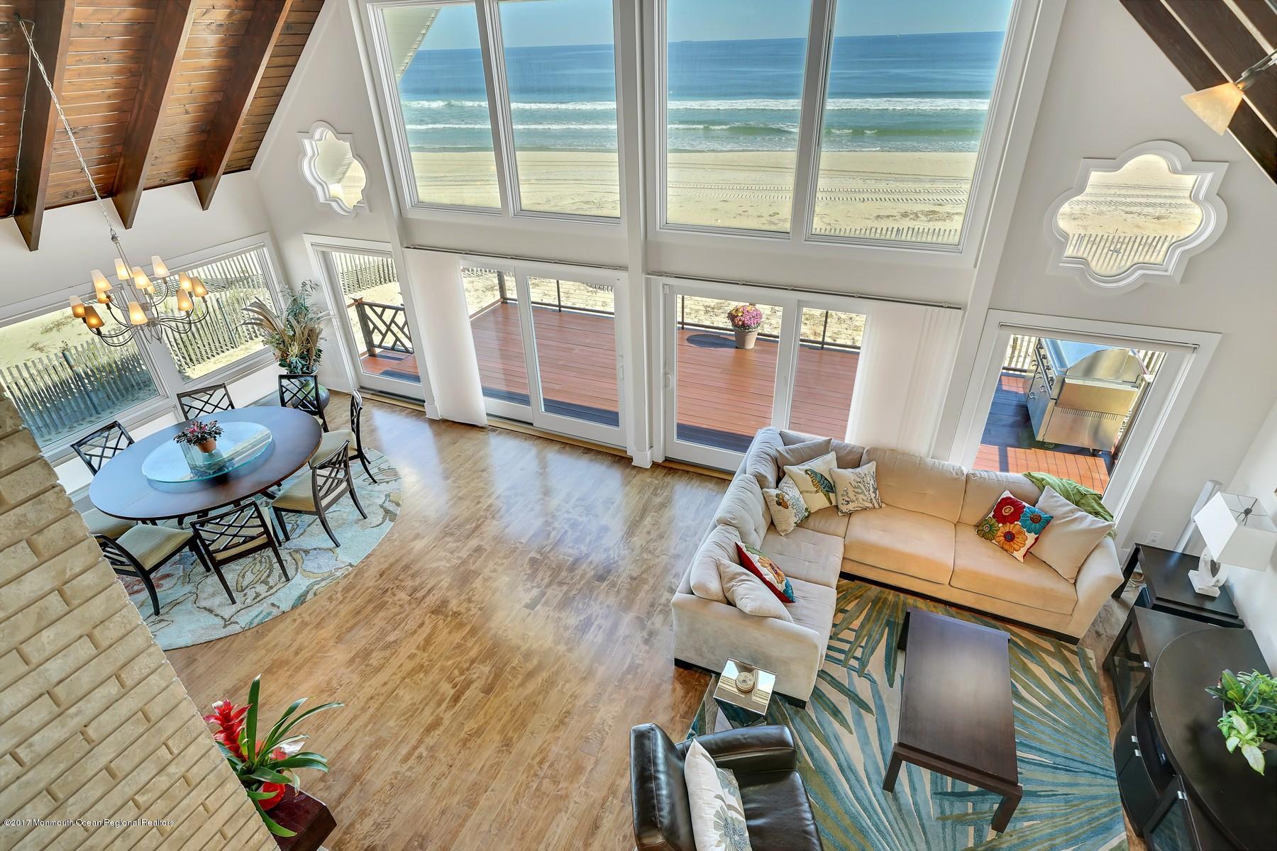 10 East Colony Road Lavallette, NJ 08735 - Photo 23 of 42 a view of a dining room with furniture a chandelier and wooden floor