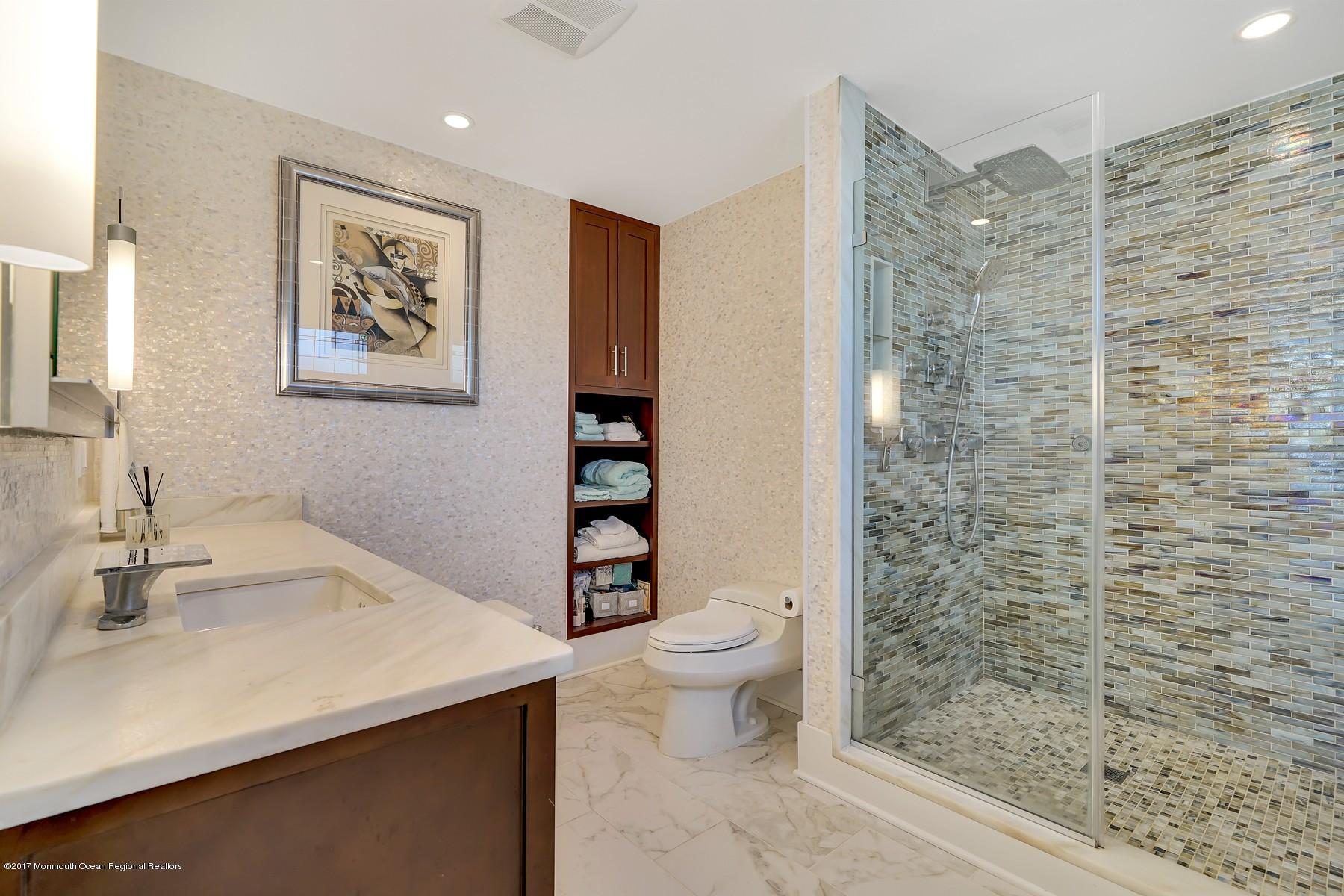 10 East Colony Road Lavallette, NJ 08735 - Photo 29 of 42 a bathroom with a sink toilet and shower