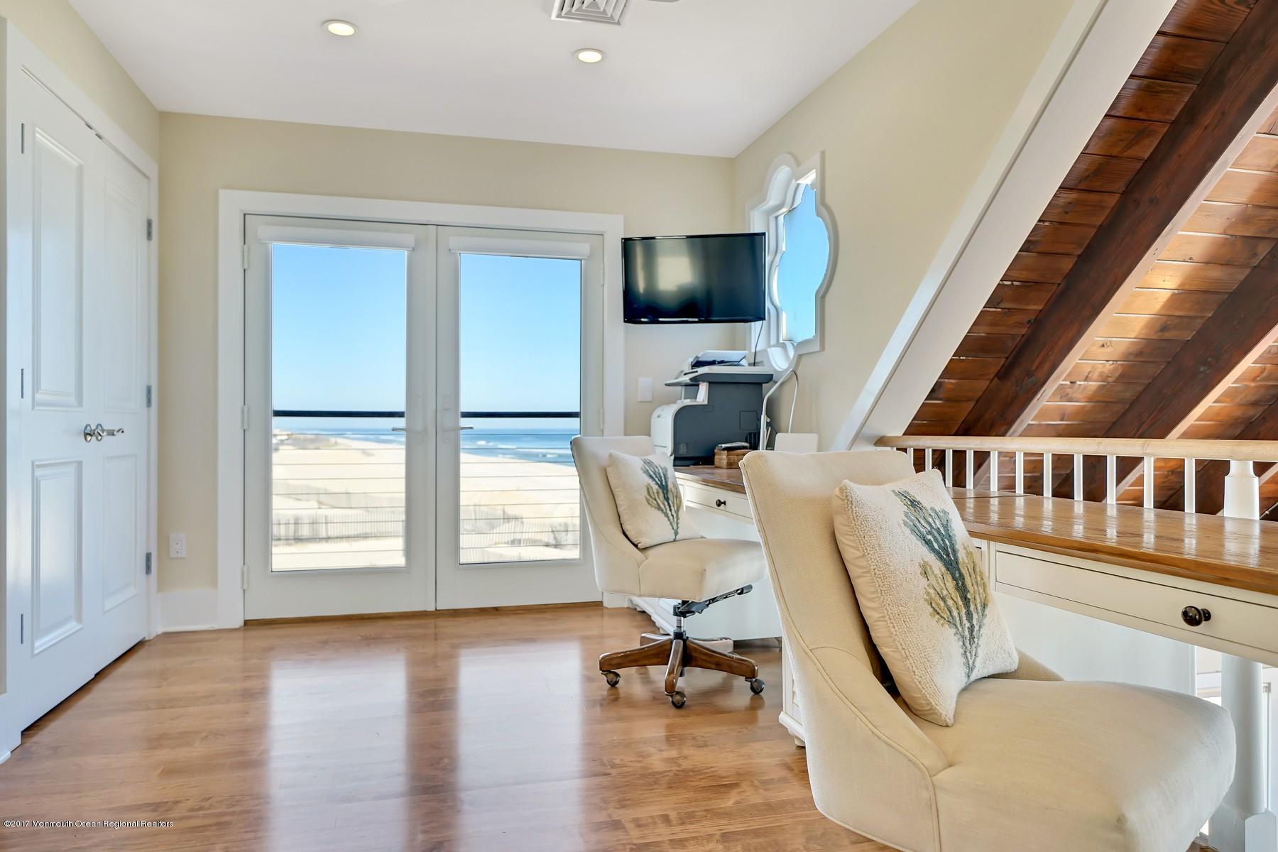 10 East Colony Road Lavallette, NJ 08735 - Photo 32 of 42 a view of a livingroom with a couch and a window