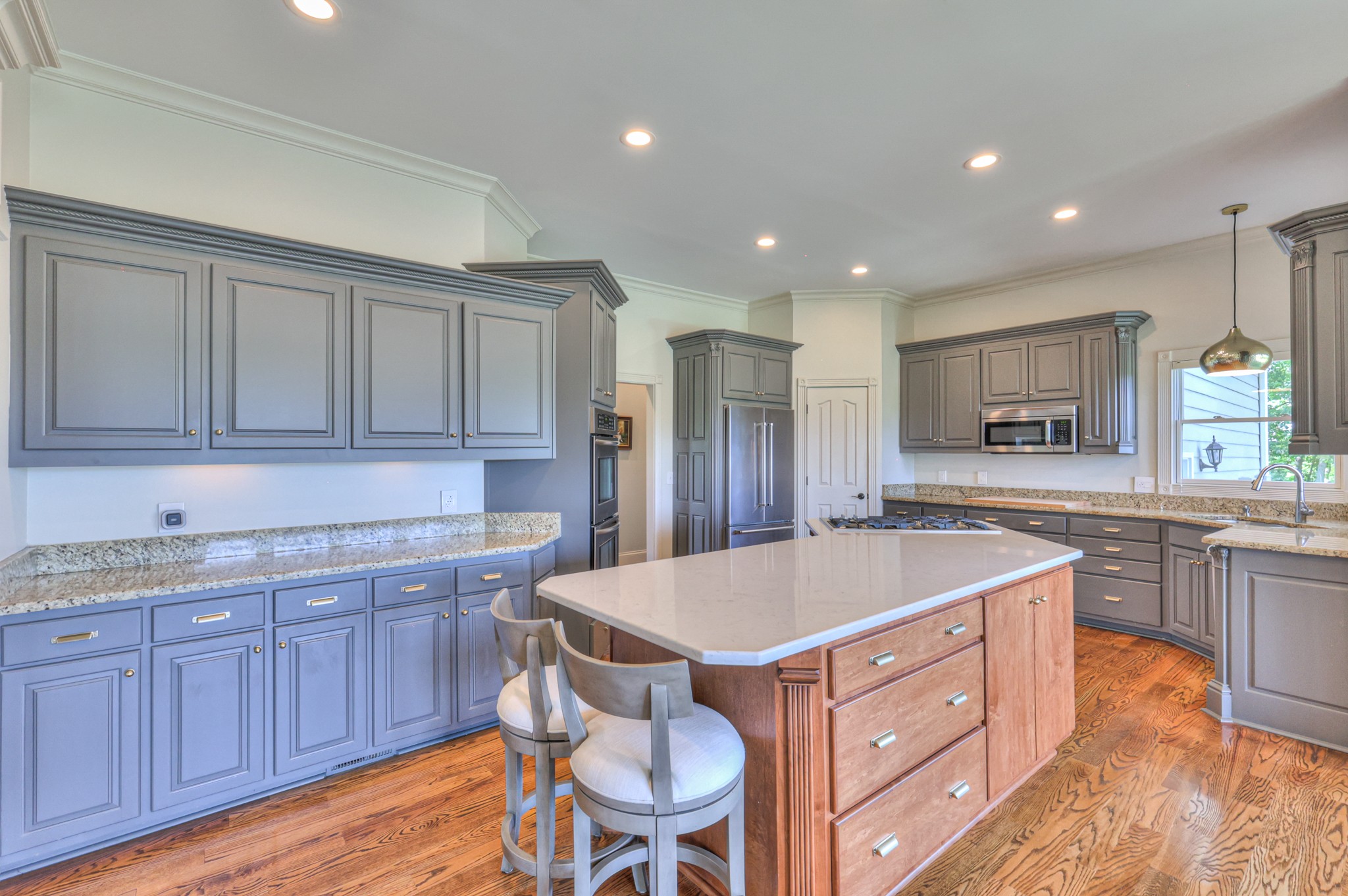 4288 Central Valley Road Murfreesboro, TN 37129 - Photo 23 of 77 a kitchen with a sink cabinets and wooden floor